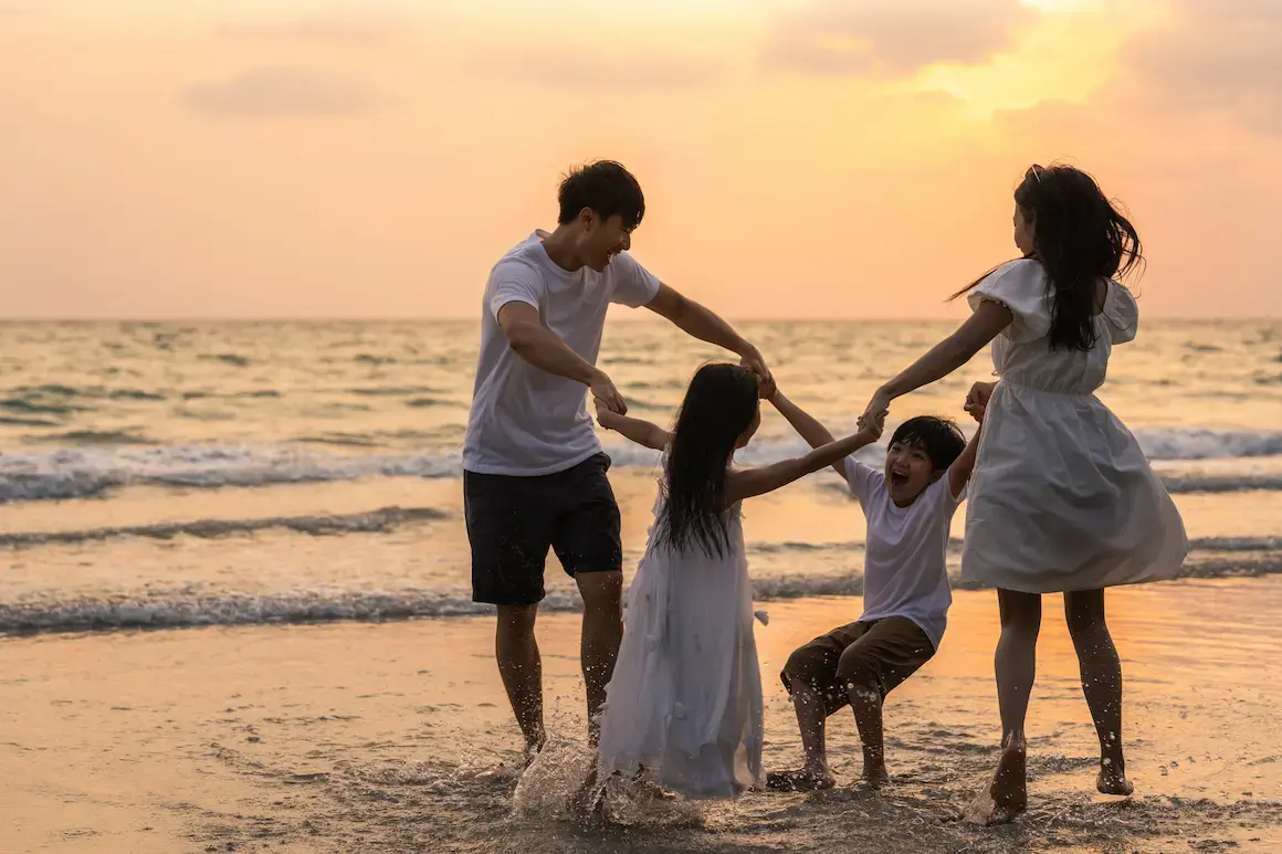 asian-young-happy-family-enjoy-vacation-beach-evening-dad-mom-kid-relax-playing-together-near-sea-when-silhouette-sunset-lifestyle-travel-holiday-vacation-summer-concept (1) (1)