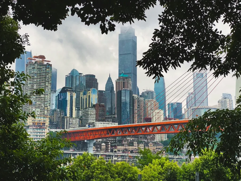  The view of Chongqing with kids  is a city like no other—dramatic mountains, swirling rivers, and futuristic skyscrapers. 