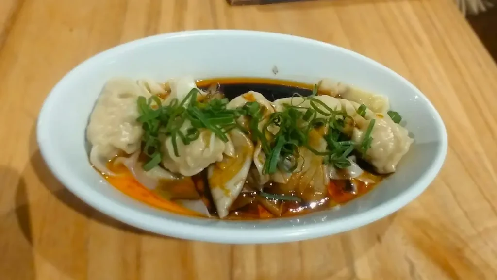 local snacks like Goubuli steamed dumplings,