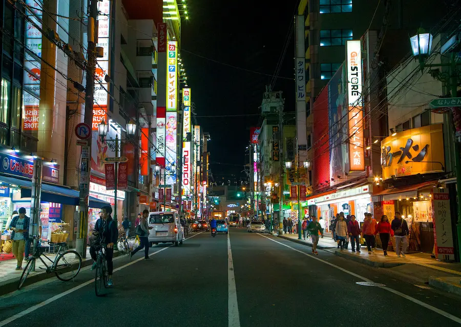 Parents waking on Osaka streets after dinner