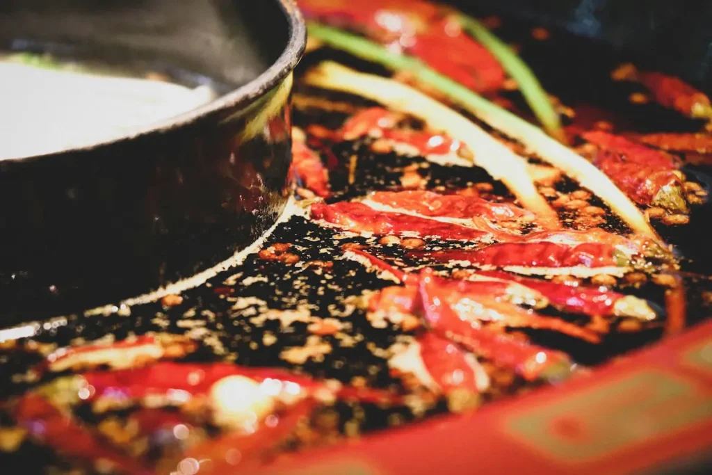 Chongqing Noodles are quite spicy and loaded with Sichuan pepper and chili. 