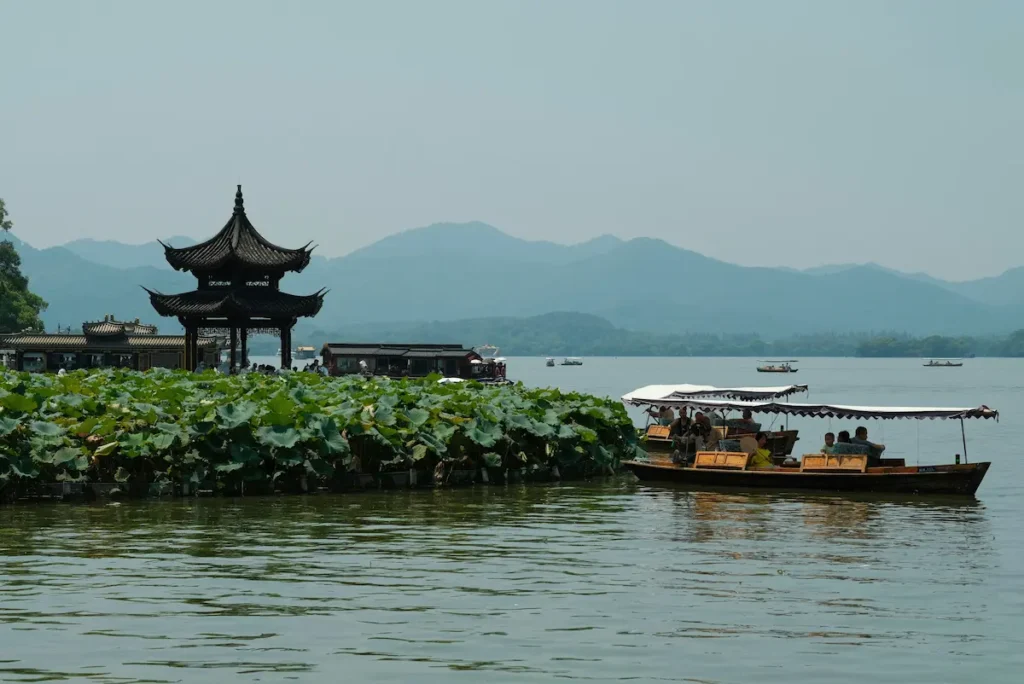 Family boating in the West Lake, Hangzhou, is the heart of your full trip.