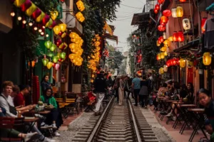 Hanoi Train Street viewed safely from a café with kids is an iconic thing to do in Hanoi.