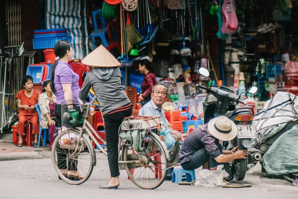 Exploring Hanoi's Old Quarter streets with kids and street life
