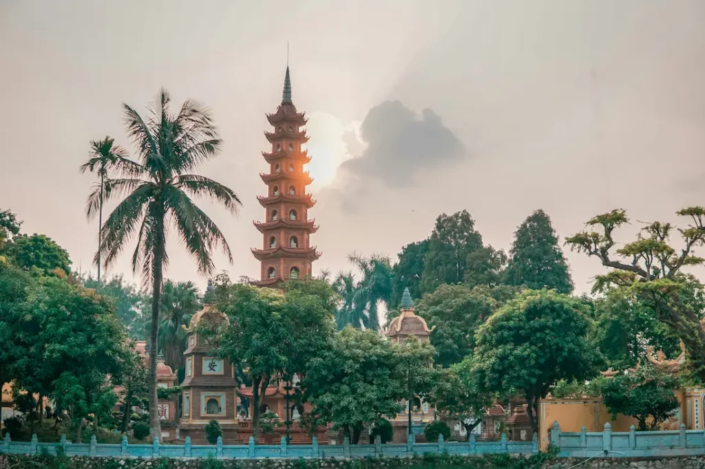 The evening stroll at Tran Quoc Pagoda, which sits on an island on the southeastern shore of Hanoi’s West Lake, is a must-visit with kids. 