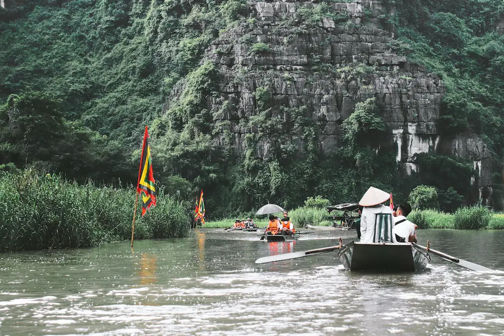 Calm scenic boat ride in Trang An, Ninh Binh, Vietnam.