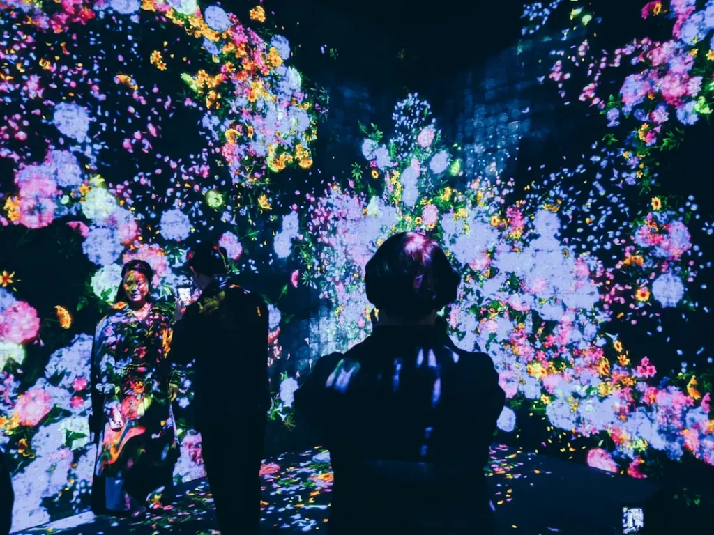 Dark interactive room at teamLab Borderless.