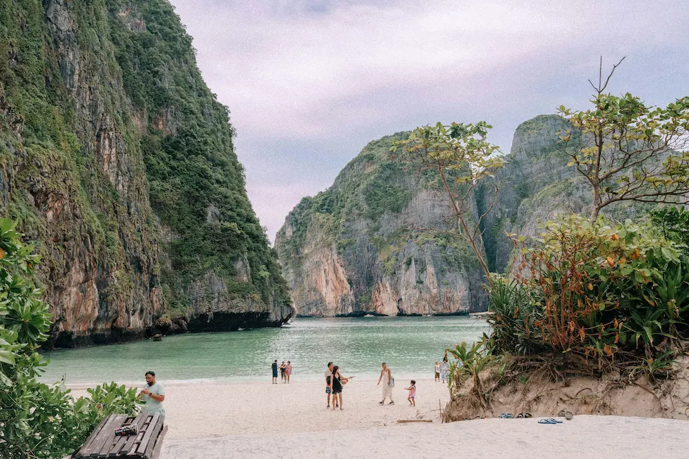 Parents exploring Asian beaches with kids