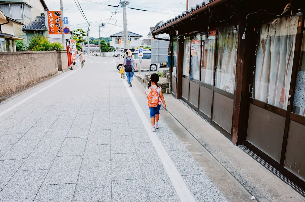 preschool age child exploring asia with family
