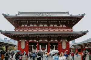 Family exploring Japenese Tokyo shrine with kids, Japan travel with children