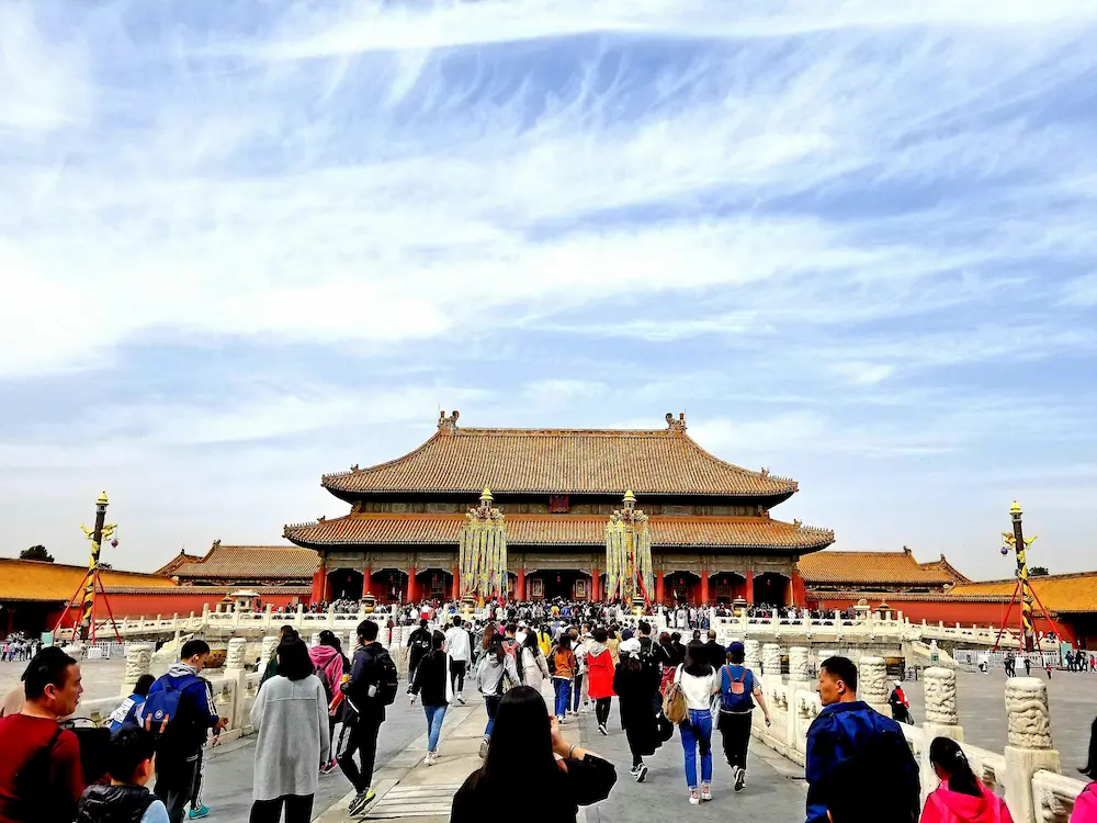 A family walking together in a Chinese city.