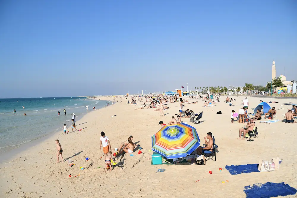 Family enjoying luxury beach vacations in Dubai beaches. 