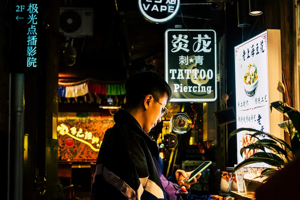 QR code payment system street vendor accepting Alipay and WeChat Pay in China