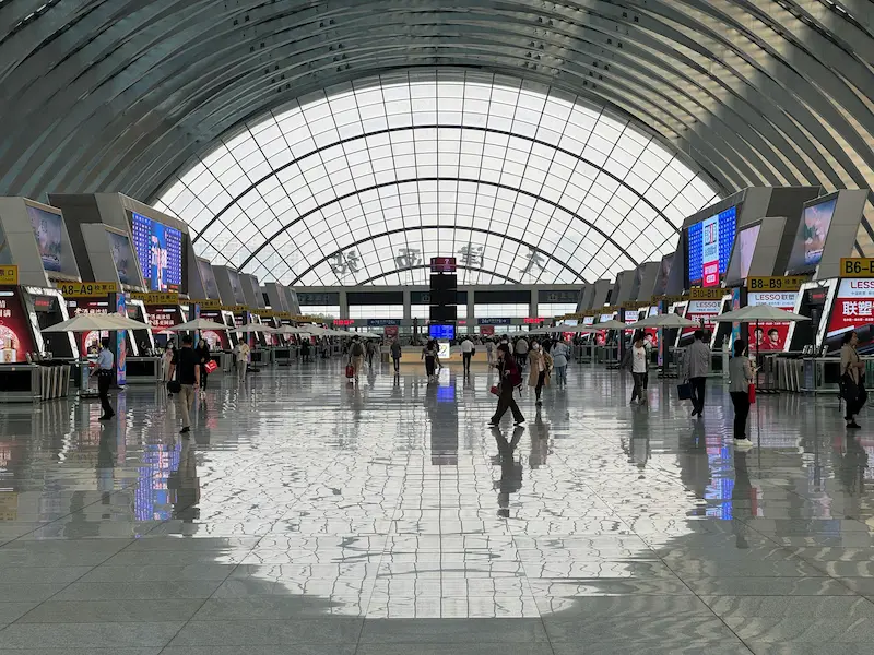 Train stations of china are huge and well managed.