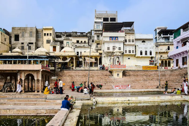 Family exploring Udaipur streets with kids.