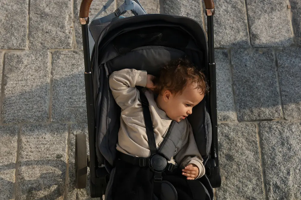 tired child adjusting to time zone long haul flight jet lag kids.