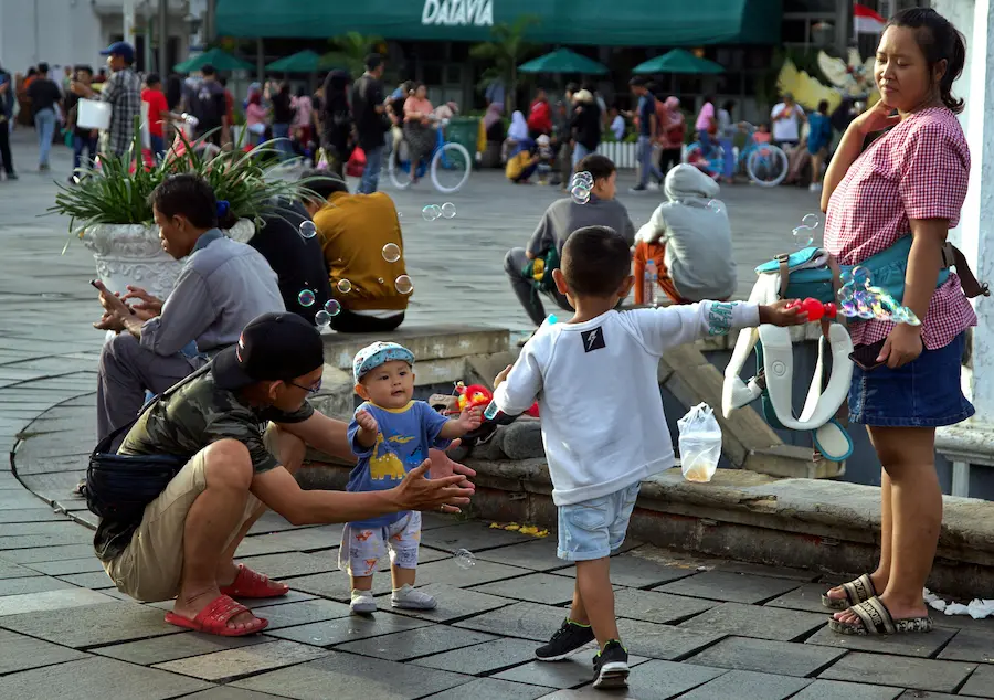 kids playing energetically day after travel jet lag false energy spike