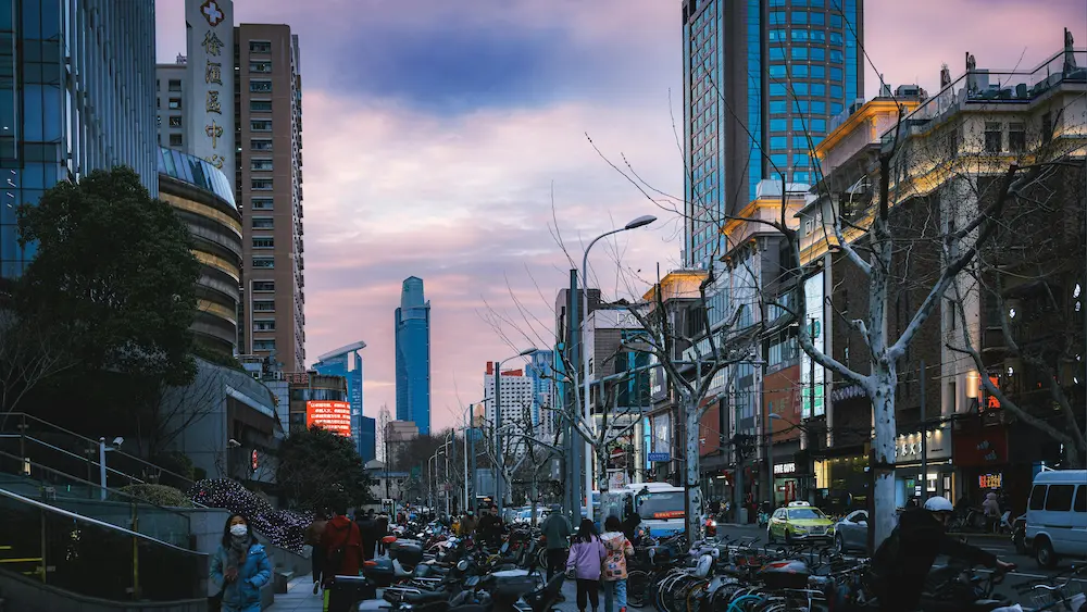 Family enjoying an evening in Shanghai streets. 