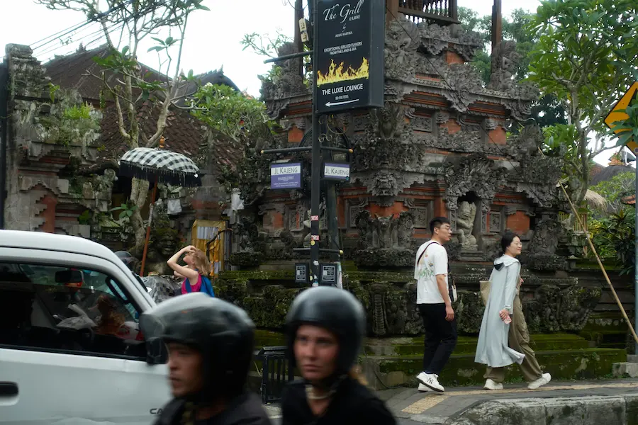 Family enjoying sunset  walk in Bali with young children
