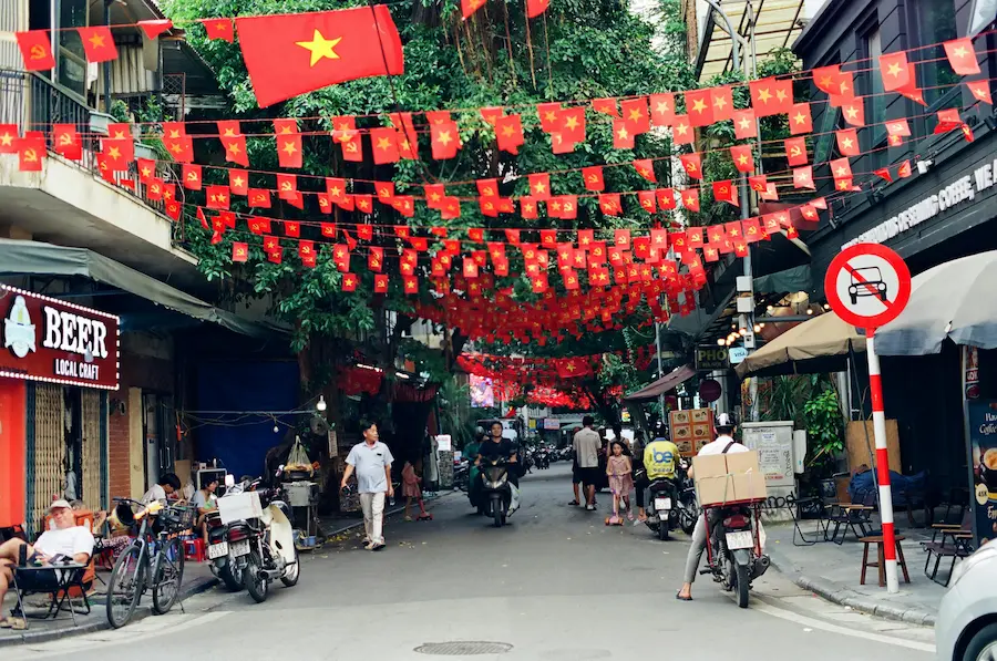 Family walking in Hanoi with kids