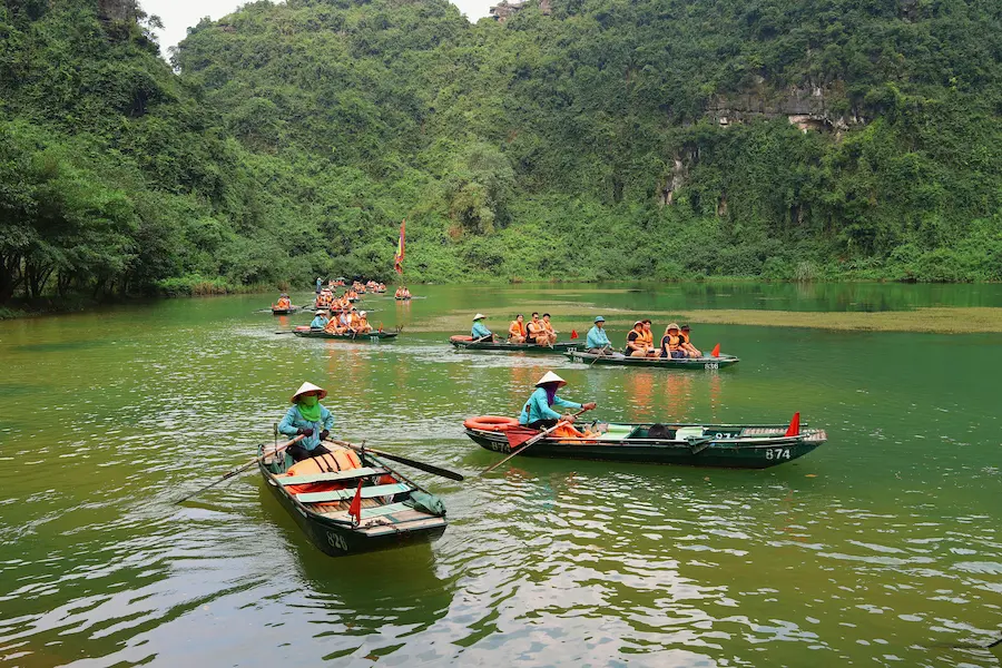 Family boat ride in Ninh Binh Vietnam with kids