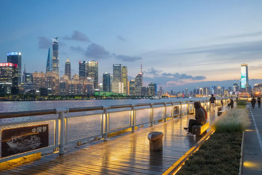 The riverside walkway in Pudong Shanghai  stroller friendly with modern skyline views.