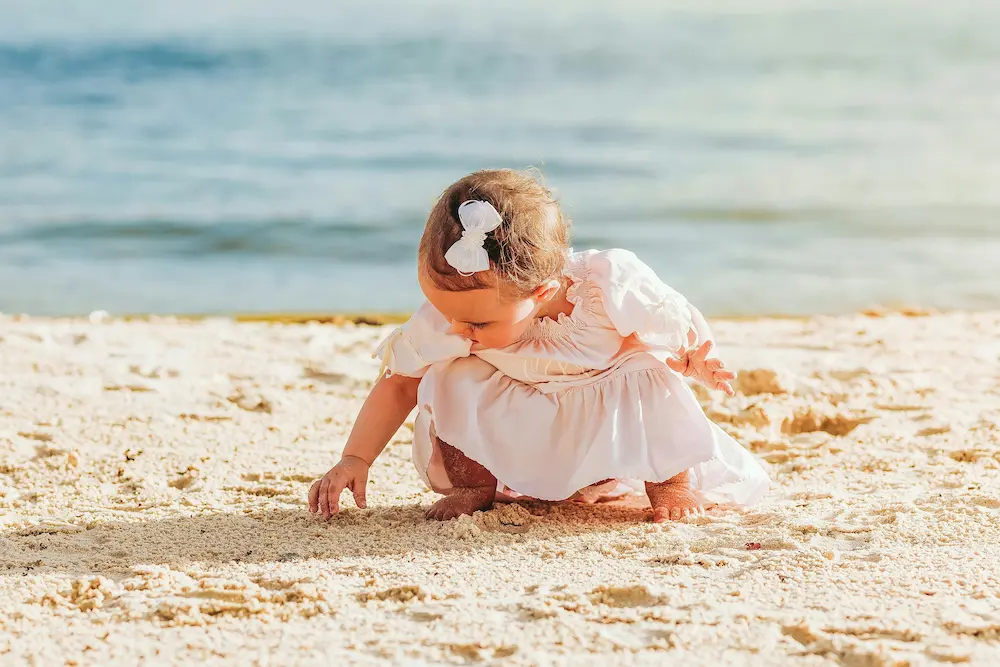 during a family vacation in Bali with a toddler, my girl on the beach
