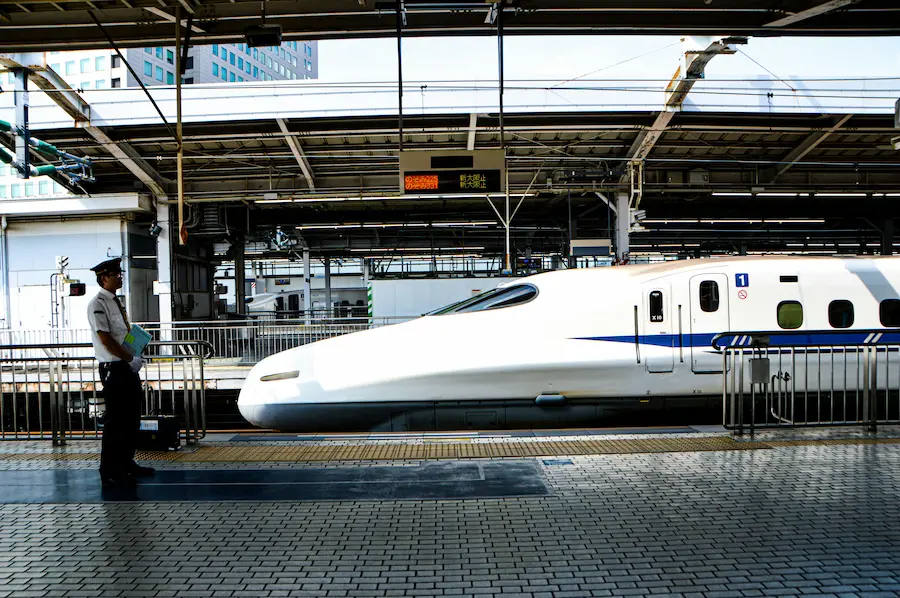 Family arriving in Kyoto by Shinkansen train