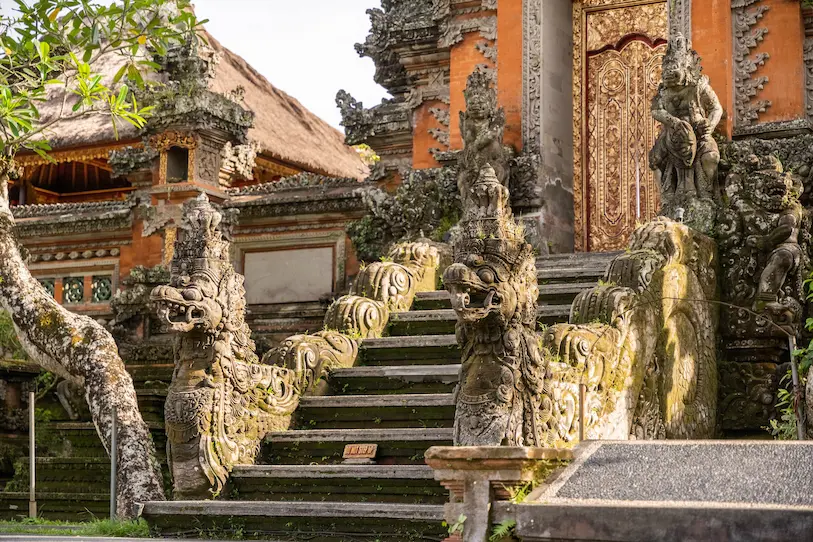 Family visiting Ubud Palace with children